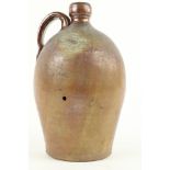 An antique earthenware (possibly Turkish) Drinking Vessel, with circular spout and shaped handle,