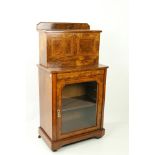 A Victorian inlaid and crossbanded walnut Secretaire Cabinet, the leather inset top above a drop