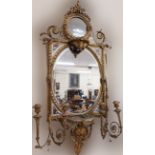 A late 18th / early 19th Century Girandole giltwood Mirror, the capital with circular mirror and
