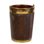 An Irish George III period mahogany and brass bound Peat Bucket, with spiral reeded tapering body