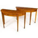 A fine pair of George III style satinwood and marquetry demi-lune Side Tables, each with a central