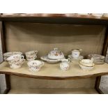 An attractive hand painted floral decorated part Tea Service,