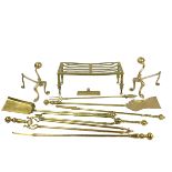 A collection of brass Fire Irons, (two sets), pair of five Dogs and one Trivet, as a lot, w.a.f. (1)