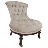 An attractive Victorian walnut Occasional Chair, with shell shaped button back and oval button