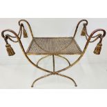 An unusual gilt wrought iron X framed Stool, with ropes and tassels and scrolls ends, 28 1/2" (