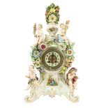 An attractive Meissen porcelain flower encrusted Clock, c. 1900, with floral finial above four