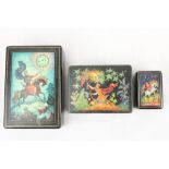 Three Russian lacquered Boxes, each cover decorated with legends and fairy tales, 5 1/4" (13cms),