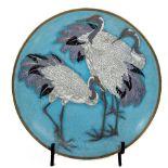 A very large Japanese cloisonné Charger, illustrated with three cranes against a turquoise ground,