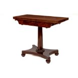 A William IV fold-over mahogany Tea Table, with octagonal pillar support on quatreform base, approx.