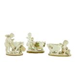 Two similar 19th Century Moore Brothers porcelain cherub Sweet Meat Stands, both encrusted with