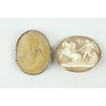 An attractive gold cased oval Cameo Brooch, of angel and horses; and another carved portrait Cameo