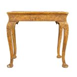A fine early carved giltwood and gesso Centre Table, the rectangular moulded top with re-entrant