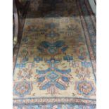 Two semi-antique Middle Eastern woollen Carpets, each of geometric and floral design, and borders,