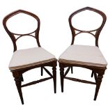 A very attractive set of 4 - 19th Century oak Neo Gothic Side Chairs, each with arched and open
