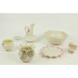 A collection of Belleek Parian ware, Second Period (1891 - 1926), comprising an ornate jug, 8" (
