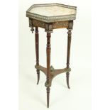 A small hexagonal marble top Plant Stand. (1)