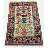 A fine quality 19th Century Middle Eastern silk Rug, the rectangular cream ground centre with