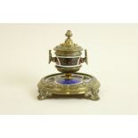 A French brass  and porcelain Inkstand, in the Sevres style, the urn shaped inkpot with two brass