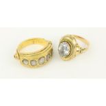 Two unusual gold Gents Rings, each inset with diamond type stones.(2)