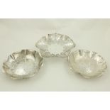 A pair of silver Dishes, by Royal Irish, Dublin 1970, the lobed body with hammered decoration, 20cms