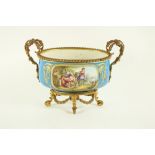 A fine Sevres style porcelain Table Centre, late 19th Century, in celeste blue,with decorated