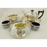 A three piece silver plated Tea Service, 20th Century; together with a pierced and silver plated
