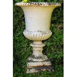 A massive pair of heavy compana shaped cast iron Garden Urns, each with a reeded rim and half reeded