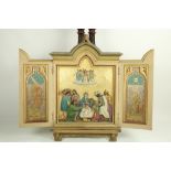 A 19th Century plaster and hand painted folding Triptych, depicting the Nativity, highlighted in
