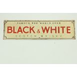 A Vintage style enamel Advertisement Sign, 'Black and White Scotch Whiskey - Famous The World Over,'