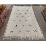 A large heavy pile Middle Eastern fawn ground woollen Carpet, with geometric design and slim border,