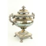 A good William IV period heavy silver plated and crested Tea Urn, with two ornate leaf cast handles,