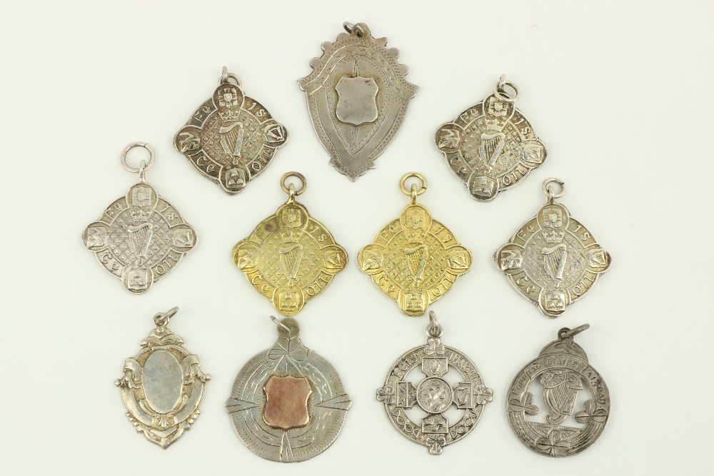 A collection of 11 various Irish silver and silver gilt Sports and Music Medals, 14grs. (11)