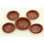 A set of 4 Regency period oval papier maché Bon Bon Dishes, each emblematic of the four seasons on a