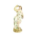 A fine Dresden porcelain Figure, modelled as a classical woman, with basket of flowers wearing a