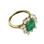 An attractive Edwardian Ladies 18ct gold Cluster Ring, with large central square emerald, surrounded