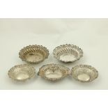 A pair of circular modern Chester silver Bon Bon Dishes, each with leaf moulded edge and spiral