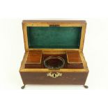 A late Regency period inlaid amboyna wood Tea Caddy, of casket form the interior with two