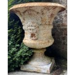 A very fine pair of heavy compana shaped cast iron Garden Urns, each with egg and dart folded rim