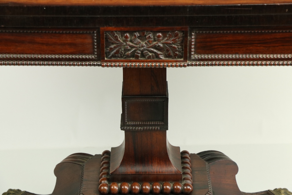 A Regency period rosewood fold-over Card Table, the bead moulded frieze with a centre panel carved - Bild 3 aus 20