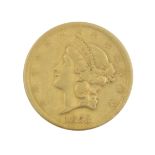 An 1853 Liberty Head $20 dollar Gold Coin, designed by James Barton Longacre, approx. 33 millimeters