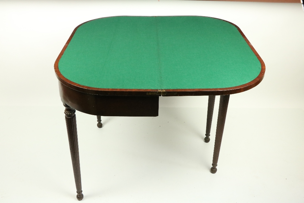 A George IV period mahogany rosewood and satinwood banded fold-over Card Table, the D shaped top - Bild 3 aus 4