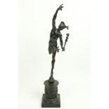 A 19th Century classical bronze Figure modelled as Mercury, holding the Medusa standing one foot