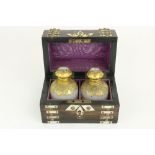 A fine coromandelwood Perfume Casket, with brass and mother-o-pearl overlay, the dome top opening to