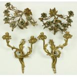 A pair of rococo style two branch brass Wall Sconces, 14 1/2' (37cms); together with a pair of six