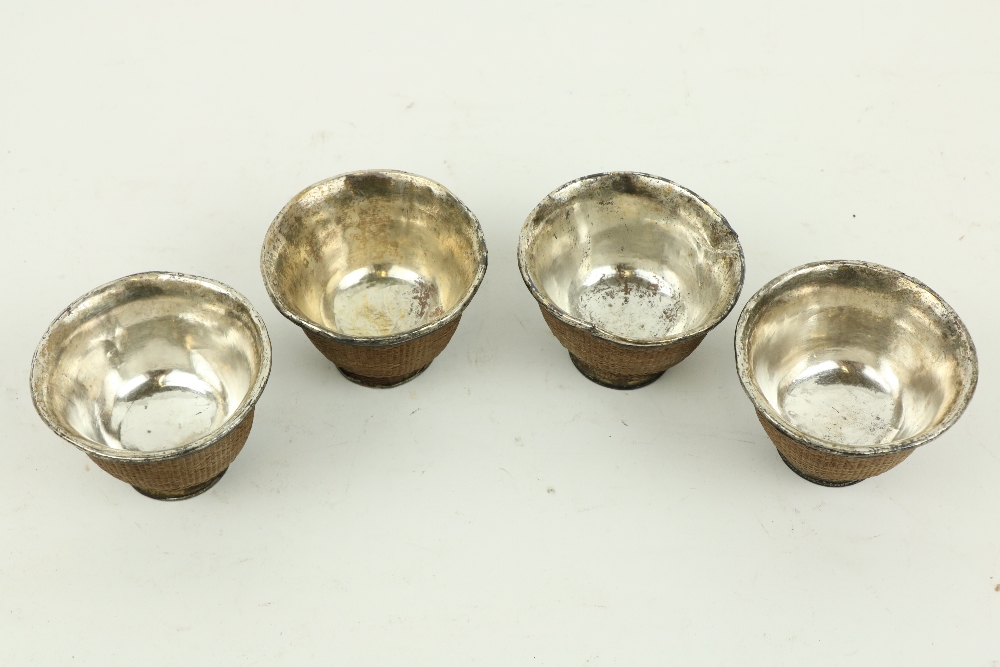 A set of 4 cased Chinese basket weave bound white metal Tea Bowls, 7.5cms (3"). (4) - Image 2 of 4