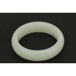 An attractive plain Nephrite white jade Chinese Bangle Bracelet, approx. 8cms diameter. (1)