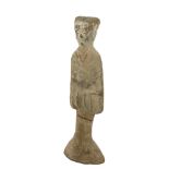 An early Chinese Male Tomb attendant probably Han Dynasty, pottery, 33cms (13") broken and re-