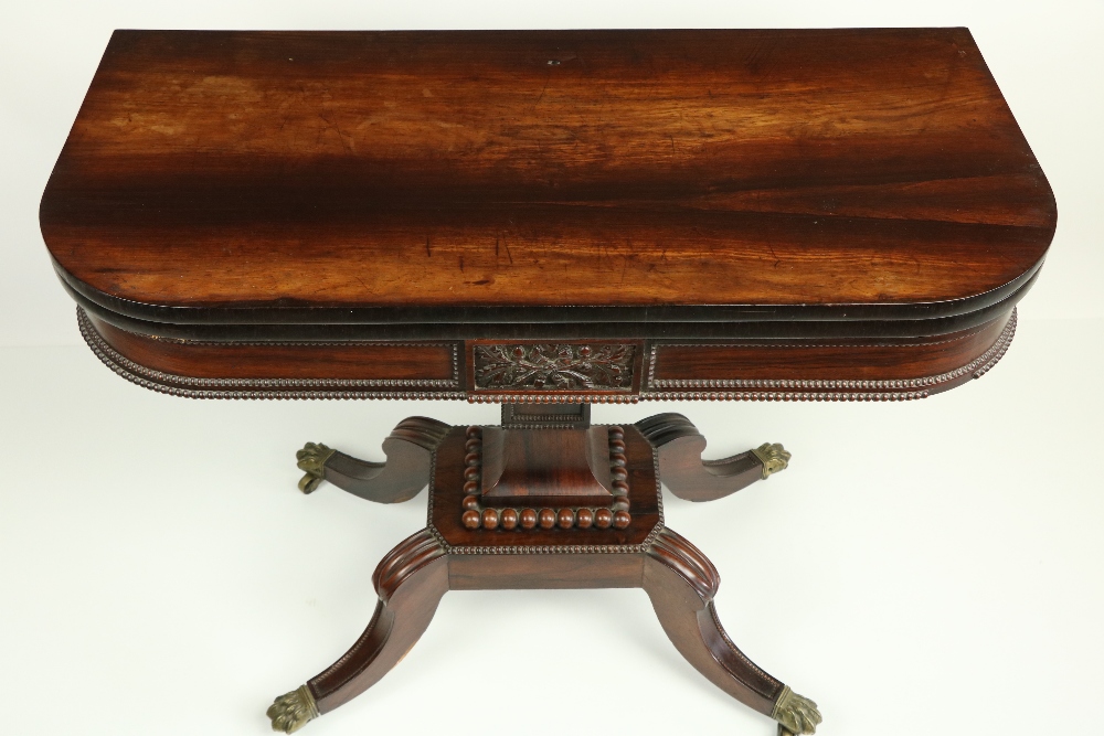 A Regency period rosewood fold-over Card Table, the bead moulded frieze with a centre panel carved - Bild 4 aus 20