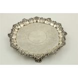 A George IV period chased and crested silver Salver, London 1824 by William Edwards, with shell