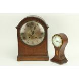 A small Edwardian balloon shaped inlaid Table Clock, 24cms (9 1/2"); together with another larger
